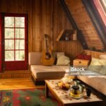 A cozy living room with rustic home decor, featuring wooden furniture, earthy tones, and vintage accents
