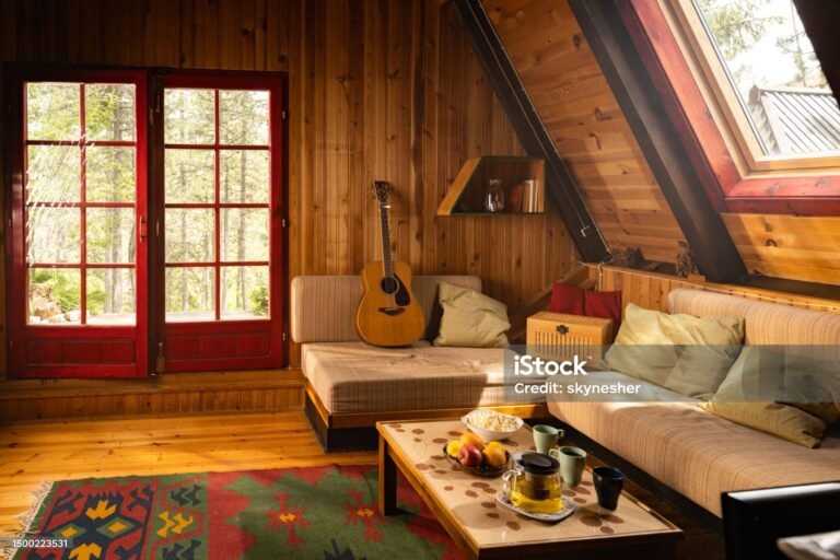 A cozy living room with rustic home decor, featuring wooden furniture, earthy tones, and vintage accents